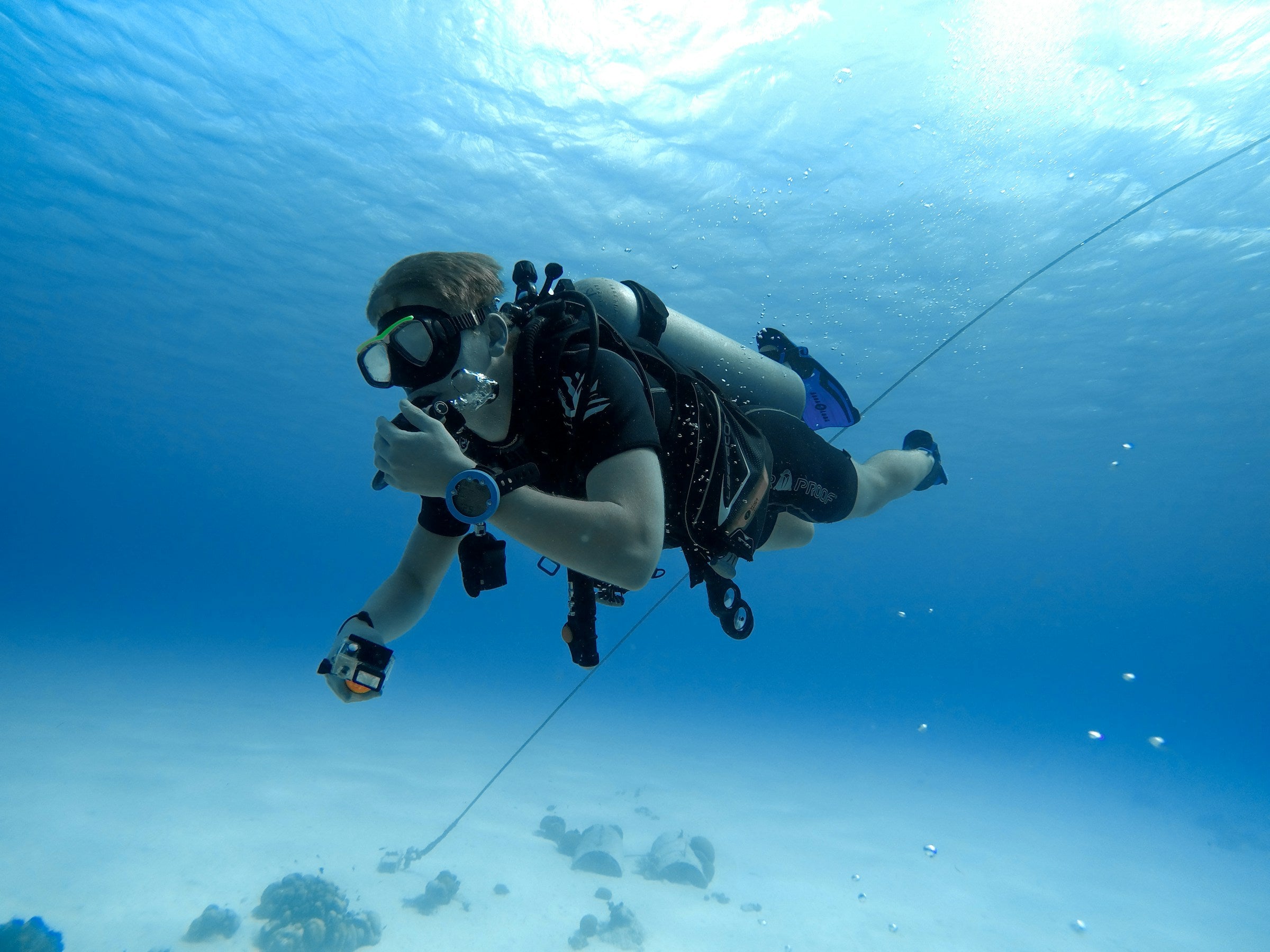 Scuba diver underwater in full gear