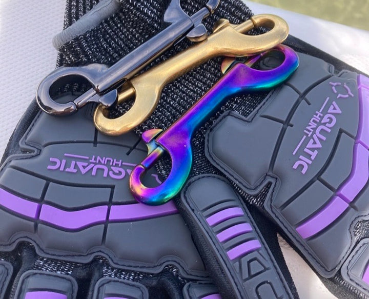Aquatic Hunt bolt snaps clipped to dive gear