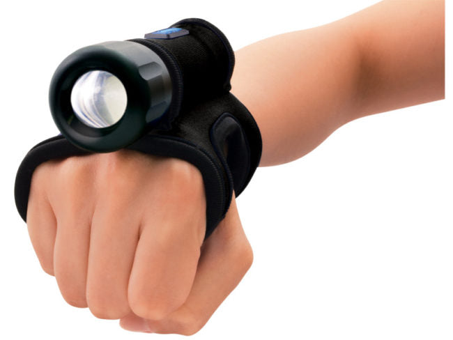 Goodman Glove worn on hand with dive light