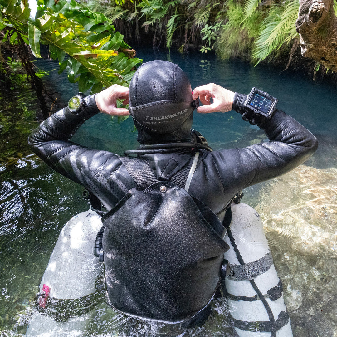 Perdix 3 worn at a cave entrance
