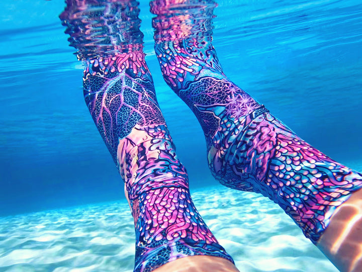 Coral Kaleidoscope dive socks worn with fins