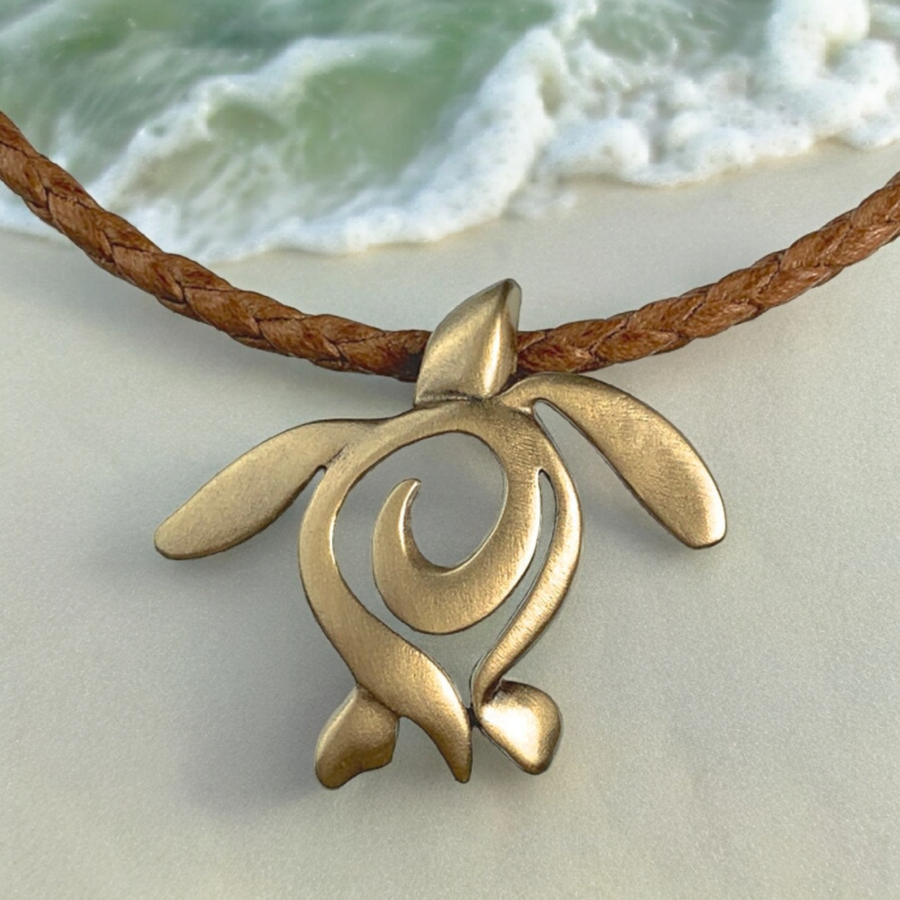 Sea turtle bronze necklace pendant detail close-up